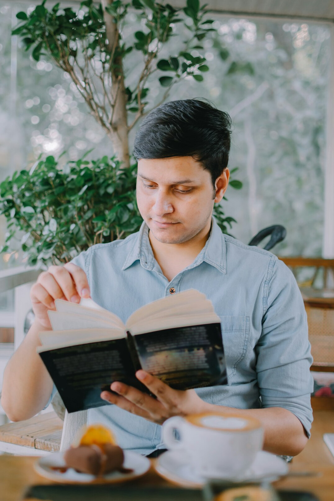 Editor reviewing news copy at a desk